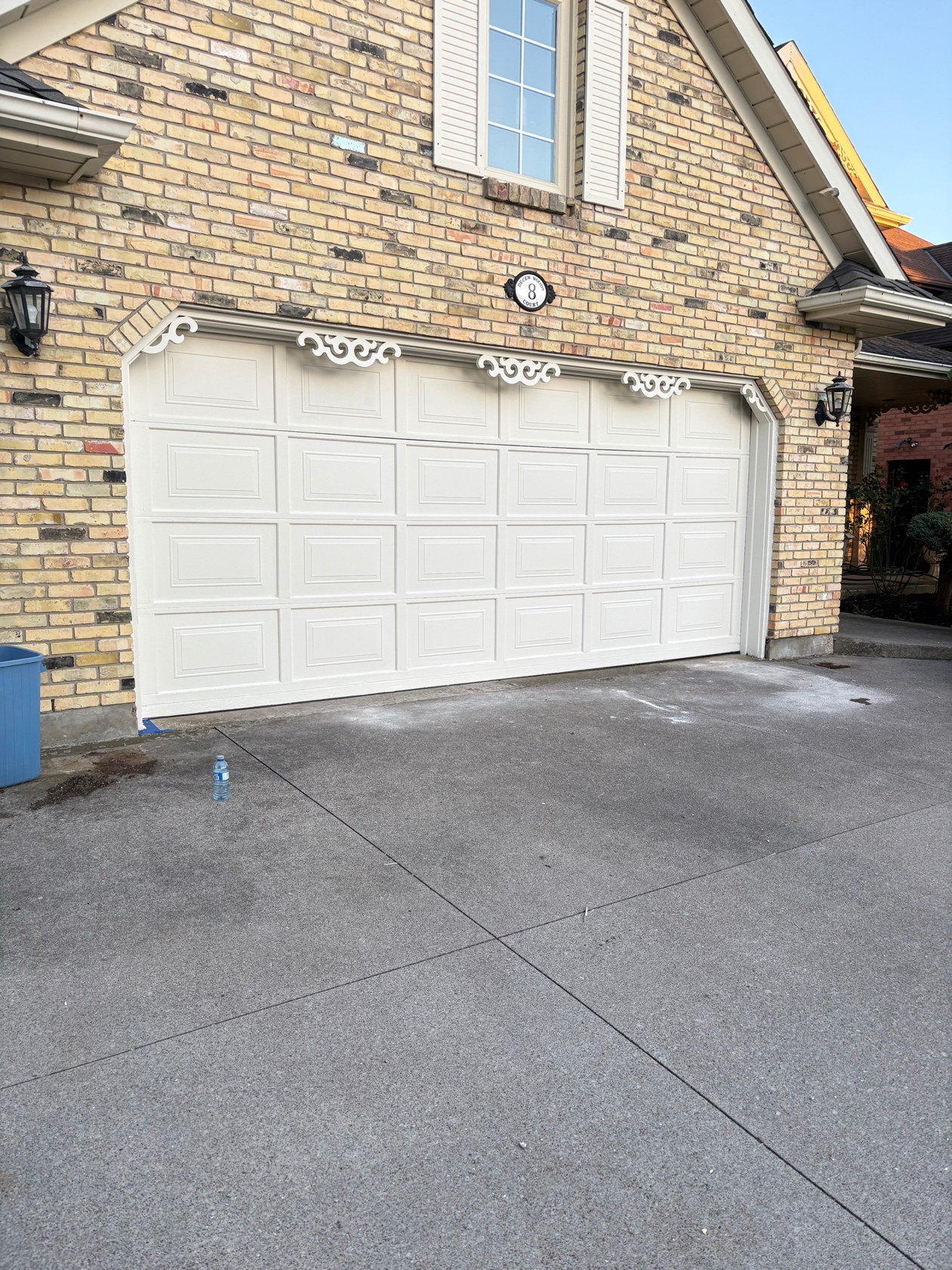 Garage doors after painting in Fossil Stone, Thorold