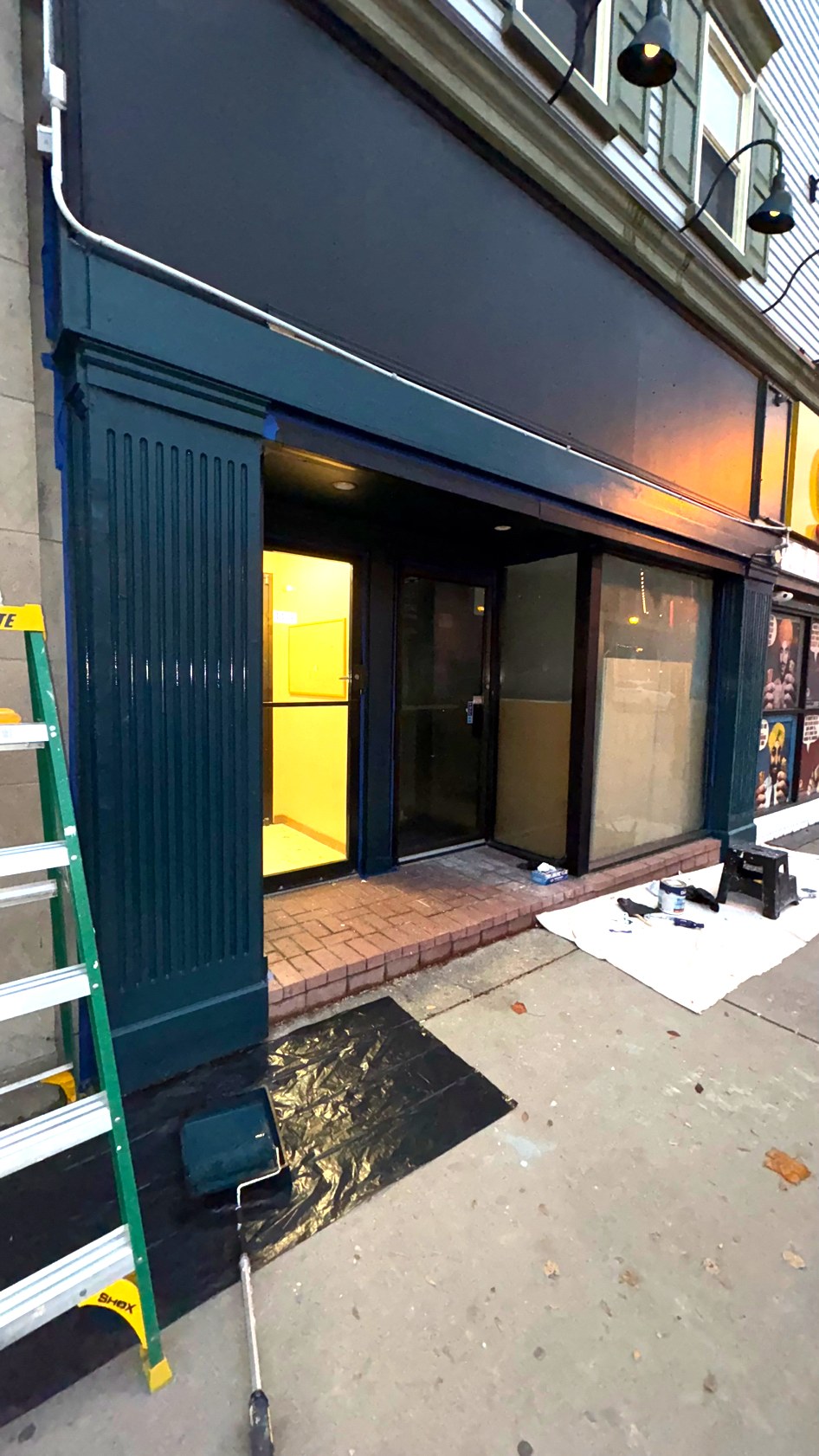 Storefront after repaint in deep navy